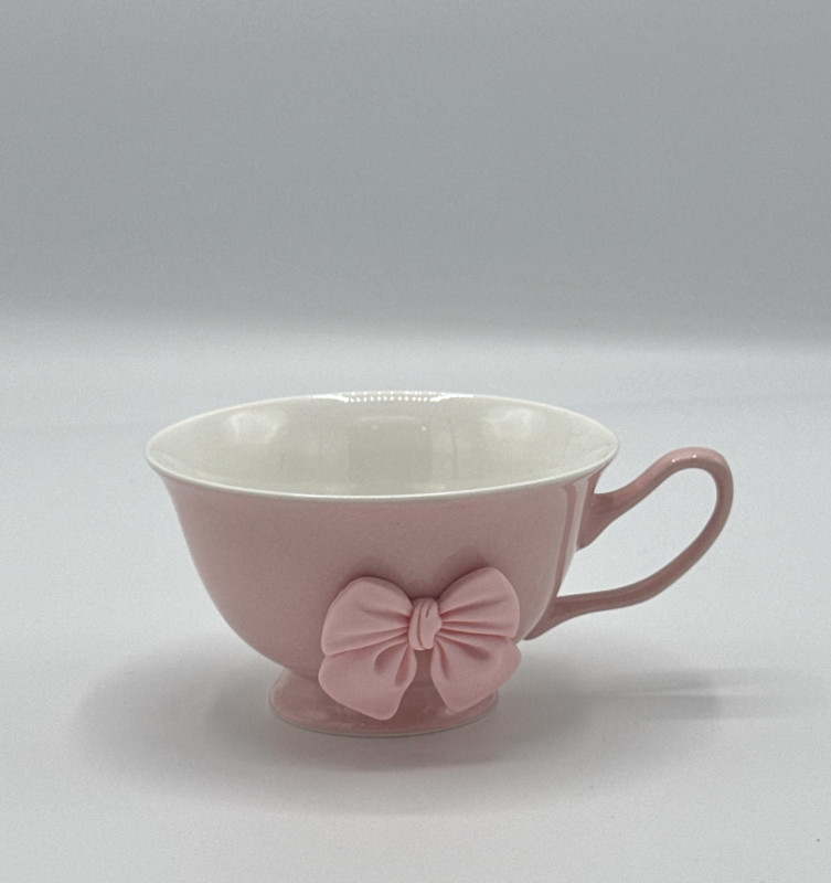 charming tea cup and saucer set